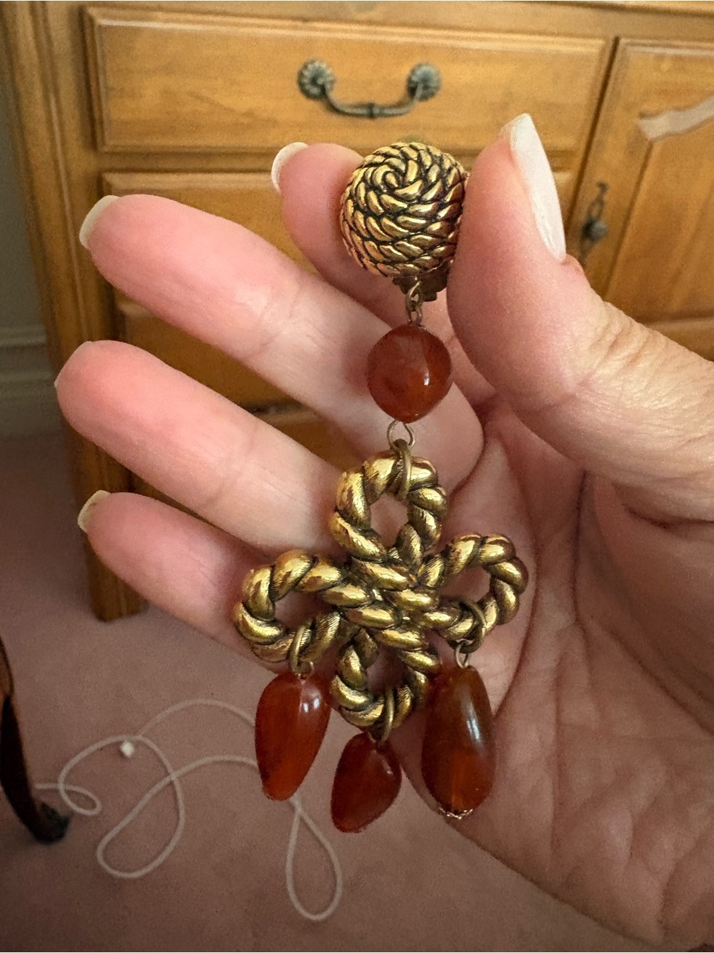Gold-Tone Braided Cross Drop Clip Earrings with Amber-Red Beads
